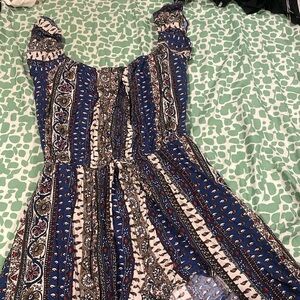 Romper piece with a dress back